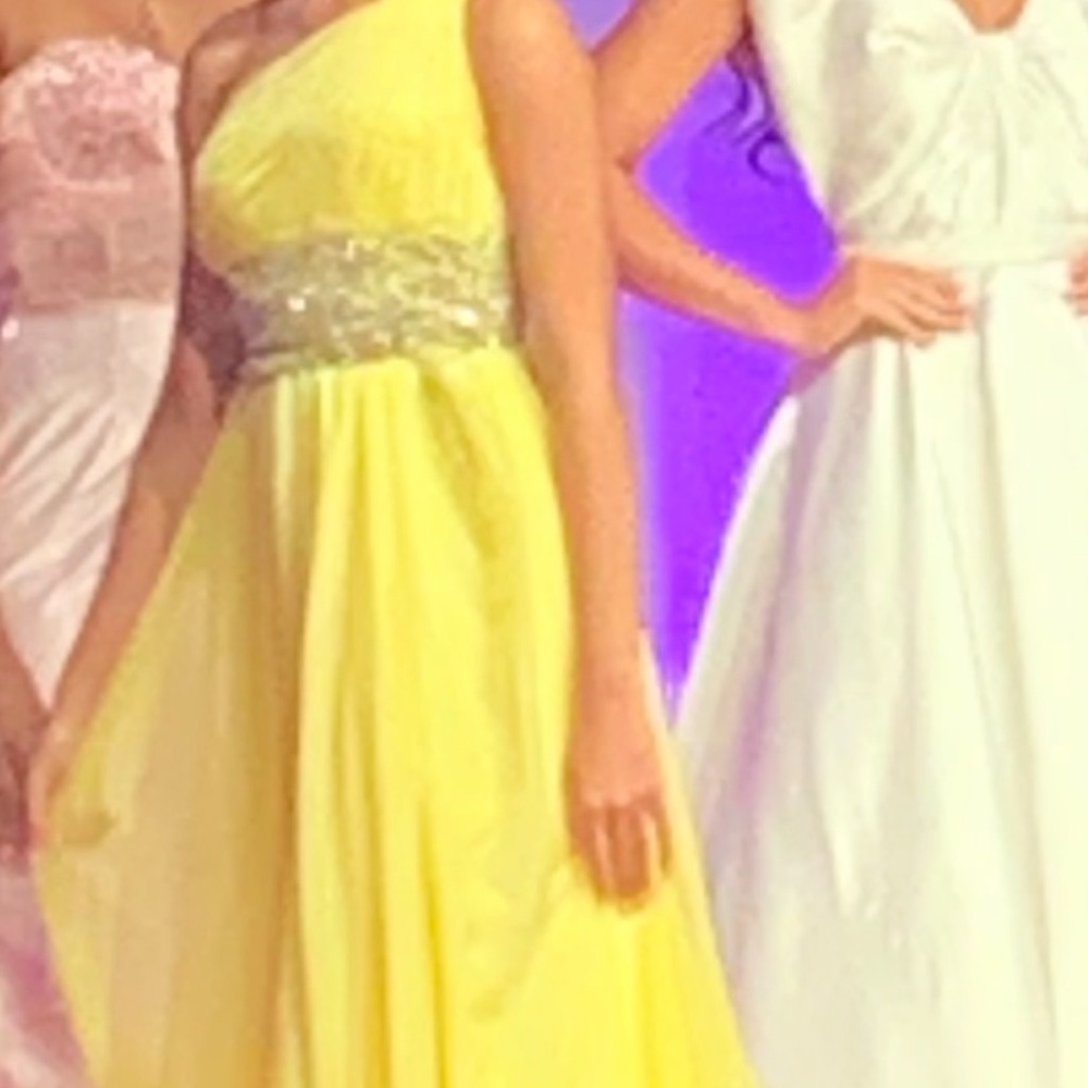 Formal, yellow, chiffon gown. High cut split. Rhinestones waistband.